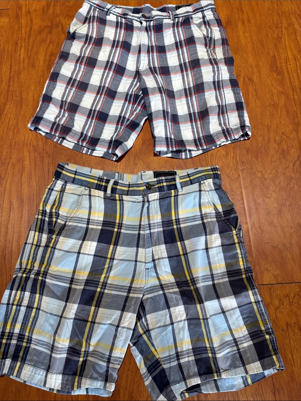 2 Pairs of Greg Norman Plaid Shirts.